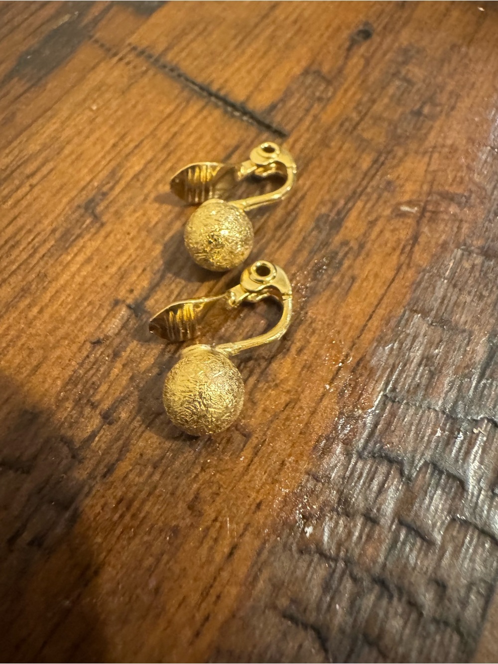 Monet clip on gold tone sphere earrings